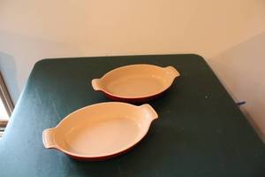 lot 412 image: Set of 2 Le Creuset Red Oval Baking Dishes