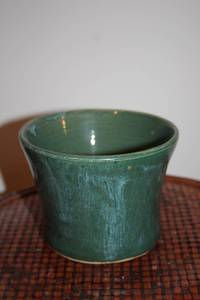 lot 482 image: Handcrafted Green Ceramic Vase with Unique Markings