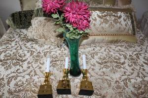 lot 559 image: 3 Gold Candle Holders with Artificial Pink Flowers in Green Vase