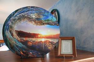 lot 589 image: Round Wall Art with Ocean Wave Design and Inspirational Framed Quote