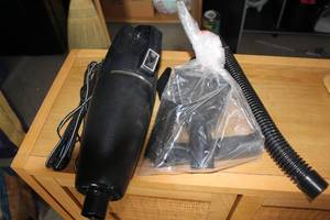 lot 651 image: Portable Handheld Vacuum Cleaner with Attachments