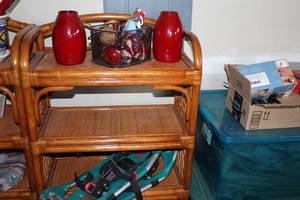 lot 682 image: Bamboo Shelf with Red Vases, Snowshoes, and Holiday Decor