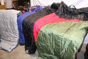 lot 7 image: Collection of 5 Sleeping Bags with Various Designs