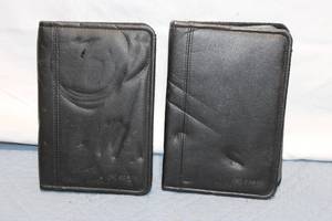 lot 44 image: Set of 2 Amazon Kindle E-Readers with Covers