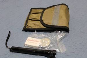 lot 76 image: Emergency Kit with Flashlight, Safety Matches, and Pouch