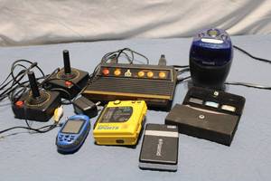 lot 84 image: Lot of Vintage Atari Flashback 2 Console with Joysticks and Philips Clock Radio