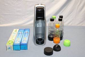lot 111 image: SodaStream Home Soda Maker with CO2 Cylinders and Bottles