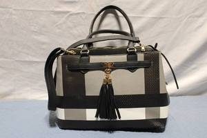 lot A-124 image: Stylish Black and White Checkered Handbag with Tassel Detail