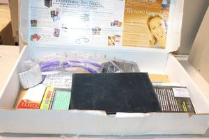 lot 153 image: Six Week Body Makeover Program with DVDs, Guides, and Exercise Equipment