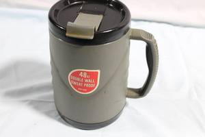 lot 219 image: 48 Oz Double Wall Sweat Proof Travel Mug