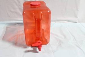 lot 252 image: Large Orange Plastic Beverage Dispenser with Spigot
