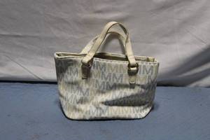 lot 282 image: Gently Used Monogrammed Handbag with Interior Pockets