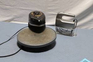 lot 299 image: Presto Pizzazz Pizza Oven, SHARDOR Hand Mixer, and Yellow Egg Carrier