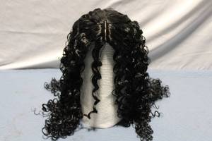 lot 313 image: Curly Black Synthetic Lace Front Wig
