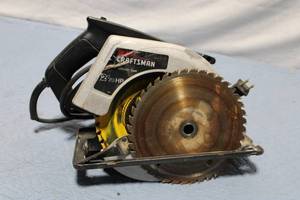 lot 319 image: Used Craftsman 2 18 HP Circular Saw with Dewalt Blade