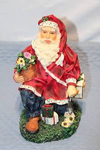 lot 366 image: Santa Claus Figurine with Floral Accents and Gift Details