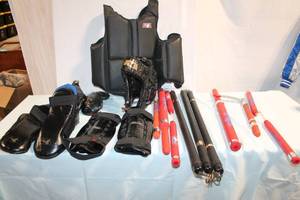 lot 382 image: Martial Arts Training Gear Set with Protective Padding and Weapons