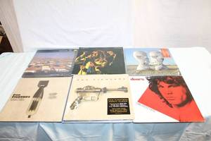 lot 387 image: Collection of 10 Vinyl Records featuring Pink Floyd, Foo Fighters, and Others