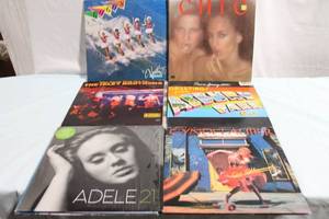 lot 388 image: Collection of 10 Vintage Vinyl Records Featuring Iconic Artists