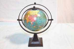 lot A-415 image: Vintage Rotating Globe on Metal Stand