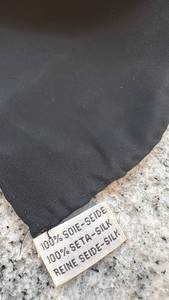 lot 30 image: Chanel Paris Silk Scarf 34x33 Inches with Chain and Jewel Motif