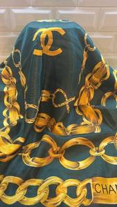 lot 59 image: Chanel Paris Gold Chain Print Scarf 35 x 34 Inches