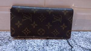 lot 65 image: Louis Vuitton Monogram Long Brown Leather Wallet