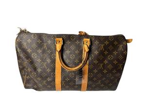 lot 71 image: Louis Vuitton Monogram Canvas Keepall 45 Travel Bag with Leather Trim