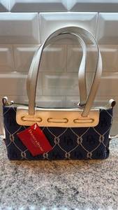 lot 7 image: Dooney & Bourke Navy Canvas Logo Tassel Zip Top Handbag