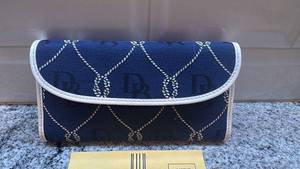 lot 8 image: Dooney & Bourke Blue Canvas Wallet with White Trim