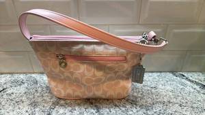 lot 10 image: Coach Pink Monogram Shoulder Bag with Tag