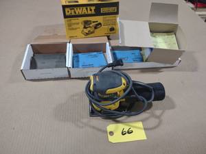 lot 66 image: Dewalt Palm Sander with Sanding She...