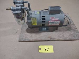 lot 77 image: Dayton Vacuum Pump...