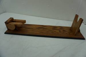 lot 15 image: handcrafted gun rest-by Gene Anderson