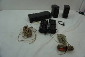 lot 21 image: Sony surround sound speaker system and speaker wire