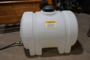 lot 139 image: 35 gallon tank with spigot