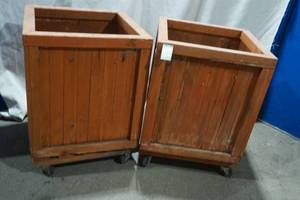 lot 149 image: 2 cedar planters on removable wheeled carts
