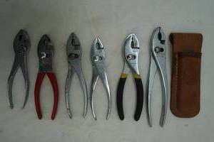lot 182 image: 7 pliers lot with leather belt holder
