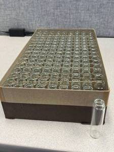 lot 4 image: One Gross - Merco, Automatic Machine Made Patent Lip Vials, 6 Dram Short Style - 85 x 23mm