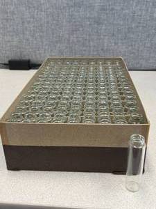 lot 6 image: One Gross - Merco, Automatic Machine Made Patent Lip Vials, 6 Dram Short Style - 85 x 23mm