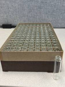 lot 7 image: One Gross - Merco, Automatic Machine Made Patent Lip Vials, 6 Dram Short Style - 85 x 23mm