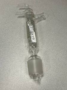 lot 64 image: Condenser Funnel, 2 Outlets, Spindle inside, 5550 Bottom