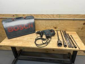 lot 23 image: BOSCH Hammer Drill with Case and Bits