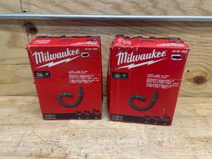 lot 62 image: MILWAUKEE Lot of 2-  Expandable Hoses for WetDry Shop Vacuums 1-78 in. 32 in. - 102 in.