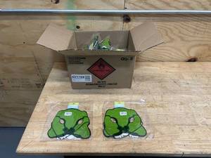 lot 124 image: OSHKOSH BGASH Lot of 50- Dinosaur Masks