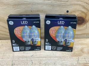 lot 87 image: GE Lot of 2 Packs of- Lumen Flame Shape LED Chandelier Light Bulbs Clear Soft White - 3.5W (2 bulbs per pack)