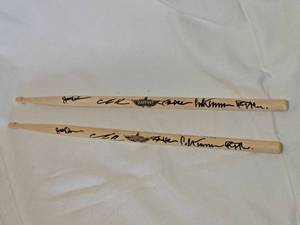 lot 12A image: Warrant-Themed Drumsticks Signed by the Members of Warrant
