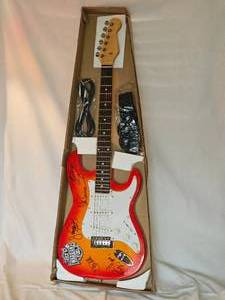 lot 12 image: Mock Fender Guitar Signed by the Members of Warrant  Autographed Sunburst Body