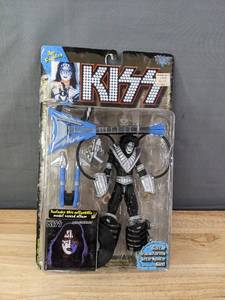 lot 75 image: KISS ACE FREHLEY GUITAR TRANSFORMS INTO SPACE SLED MCFARLANE TOYS 1997 New In Box