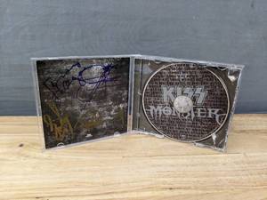 lot 5 image: Autographed KISS Monster CD Booklet with CD and Case
